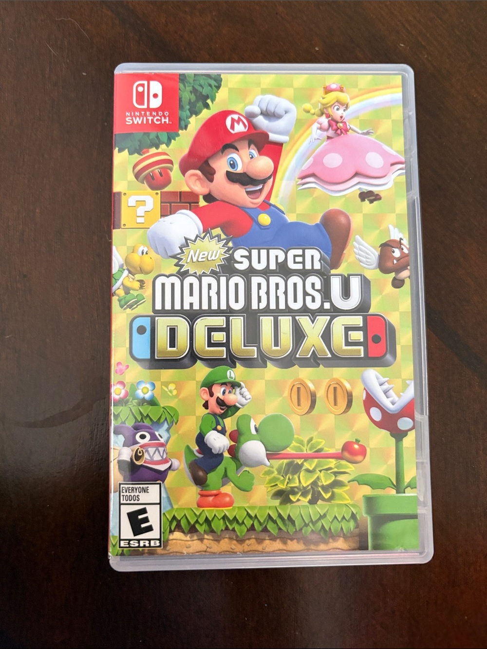 Nintendo New Super Mario Bros. U Deluxe – Yellow & Red Cover